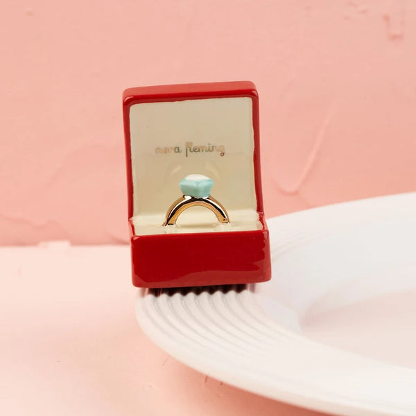 Nora Fleming put a ring on it