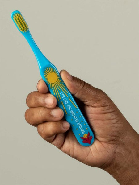 Blue Q Toothbrush Invented Smiling